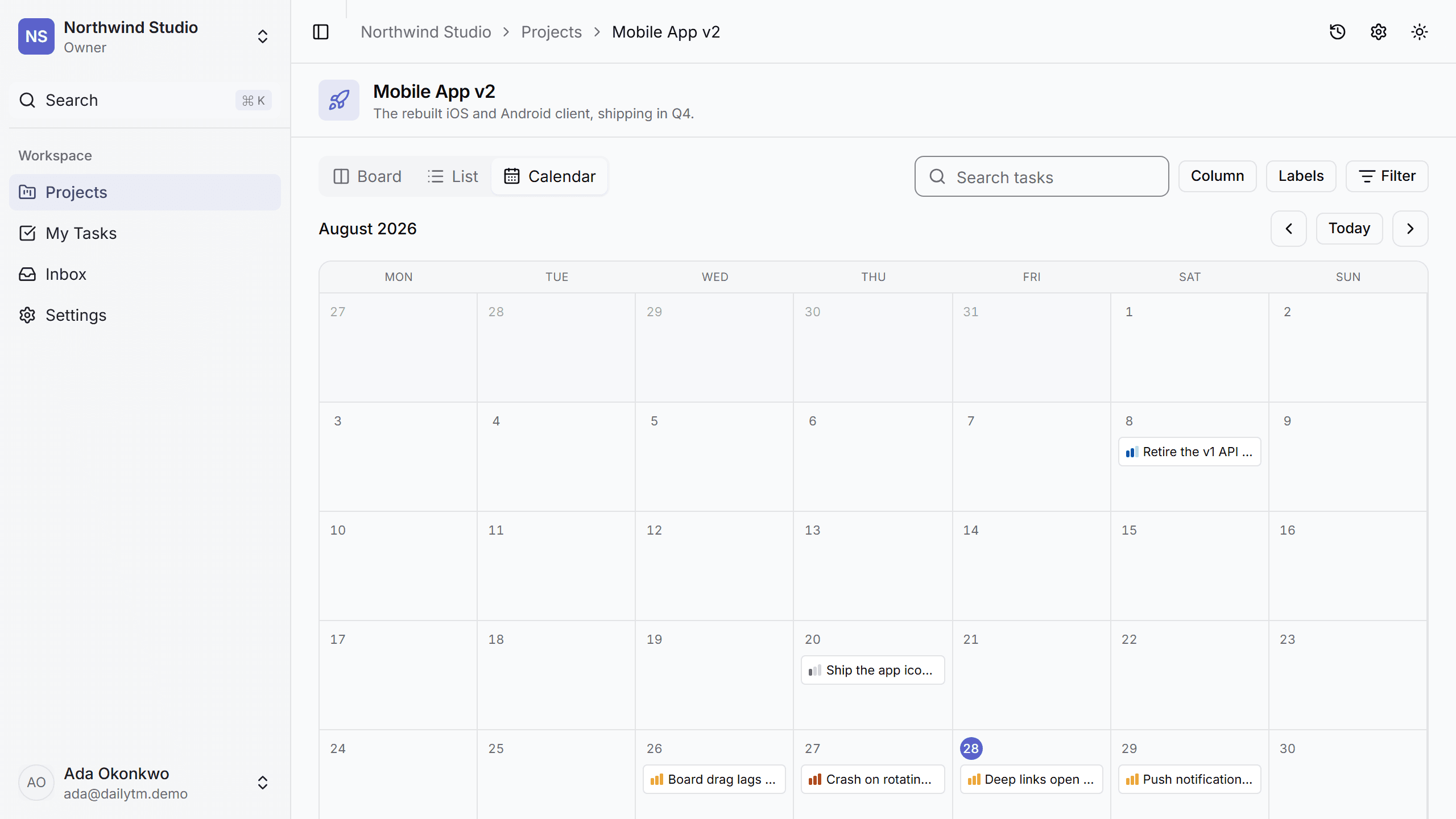 The calendar view: a month grid with tasks placed on their due dates, coloured by priority.